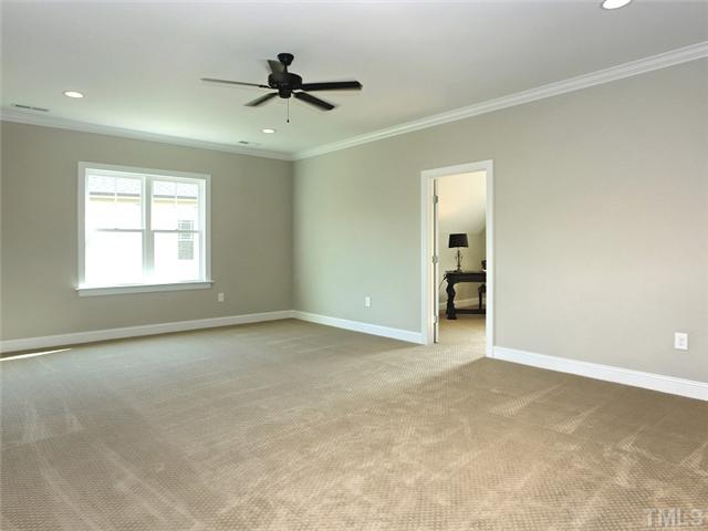 2305 Finley Ridge Lane Raleigh, NC 27615 - Photo 23 of 25 a view of an empty room with a window