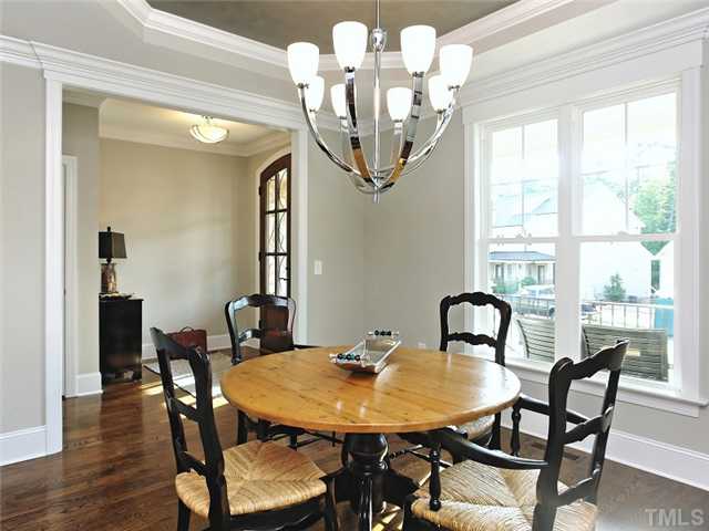 2305 Finley Ridge Lane Raleigh, NC 27615 - Photo 7 of 25 a view of a dining room with furniture window and wooden floor