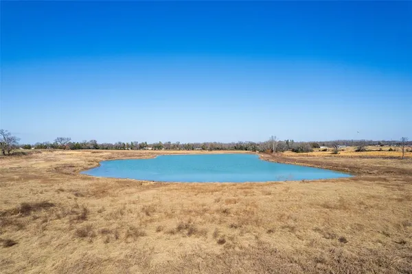 a view of an ocean and city