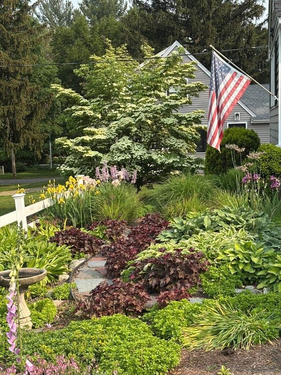 26 Lothrop Road Reading, MA 01867 - Photo 36 of 41 a view of a house with a yard