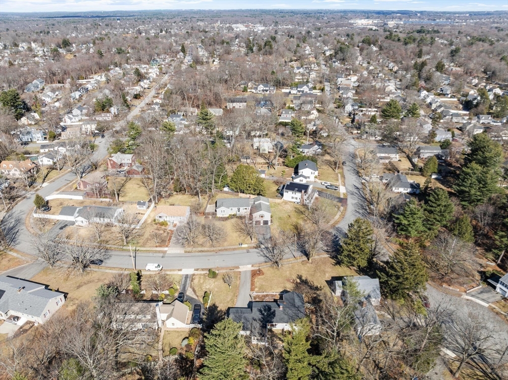 26 Lothrop Road Reading, MA 01867 - Photo 40 of 41 an aerial view of residential houses with outdoor space