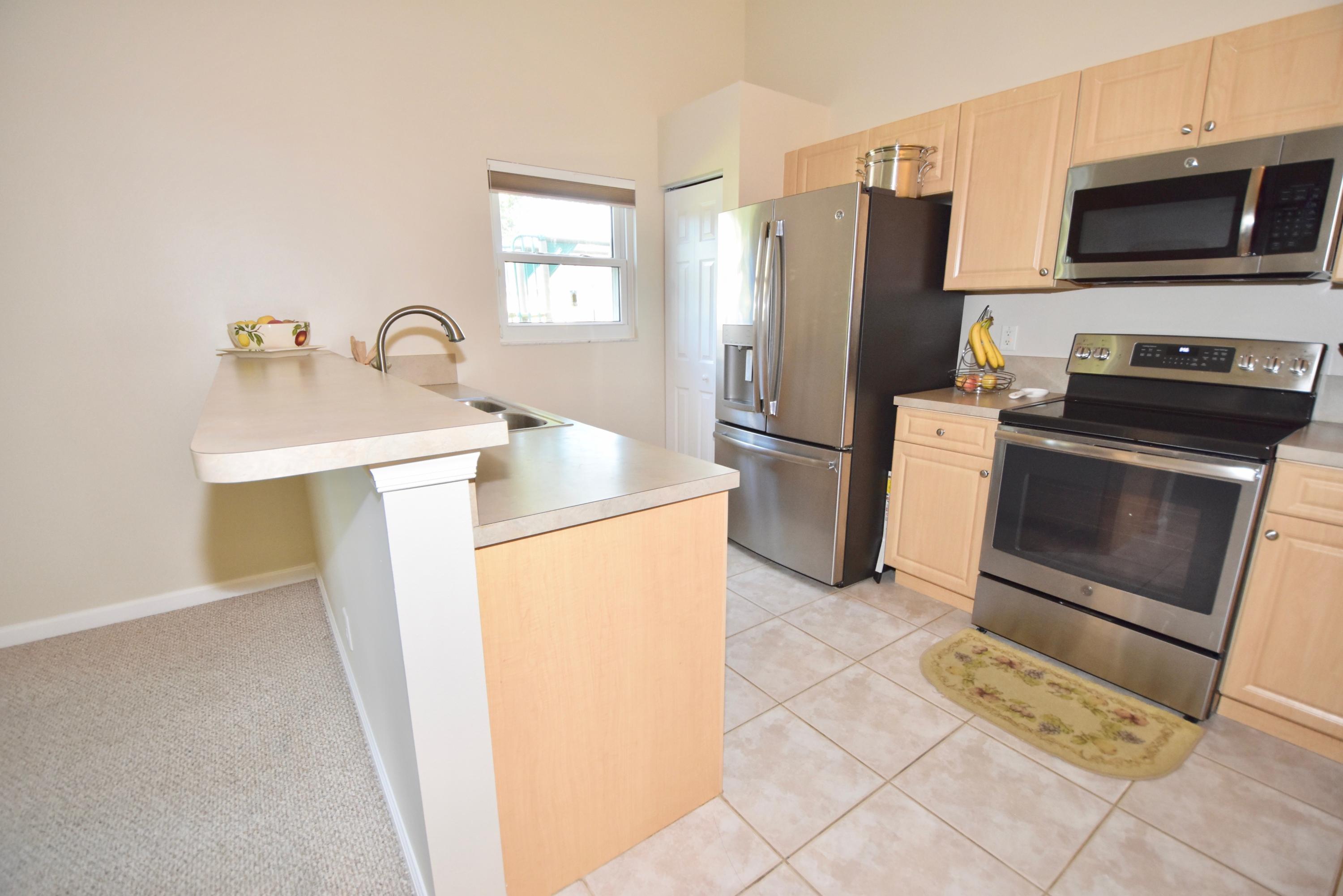 2469 Southwest Regency Road Stuart, FL 34997 - Photo 26 of 75 KITCHEN
