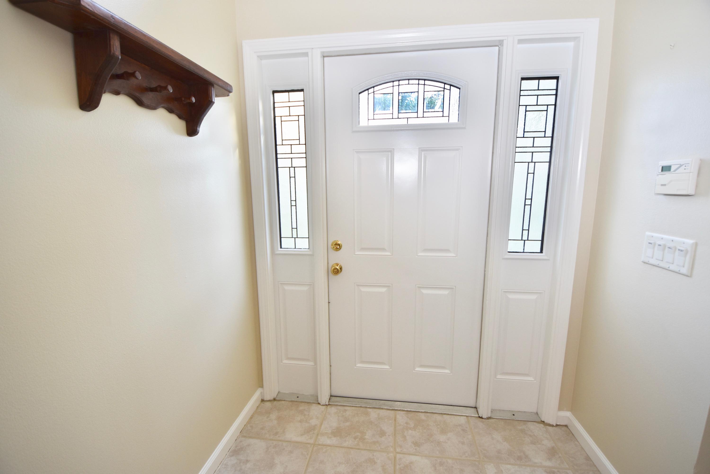 2469 Southwest Regency Road Stuart, FL 34997 - Photo 5 of 75 FRONT DOOR