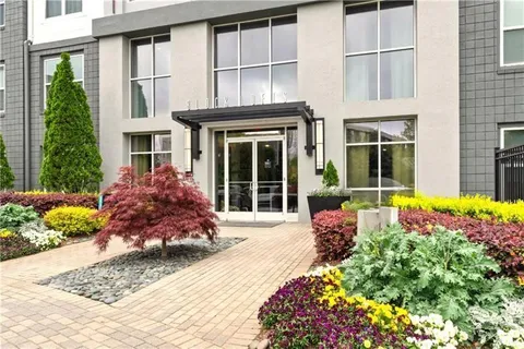 a front view of a multi story residential apartment building