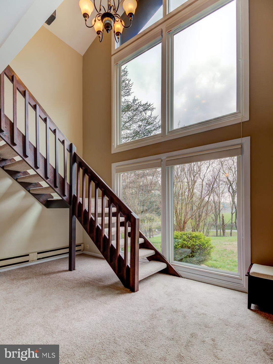 645 Locust Grove Road West Chester, PA 19382 - Photo 13 of 24 Staircase, Wall of windows