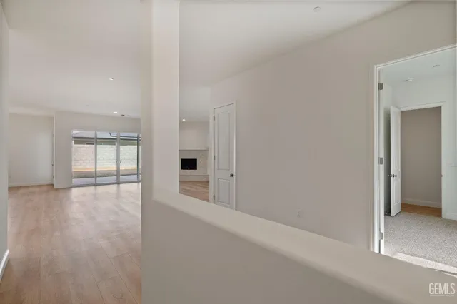 a view of an empty room and window