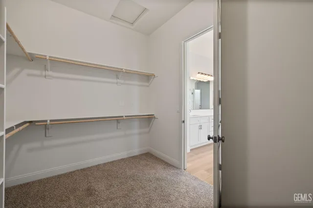 a view of an empty walk in closet
