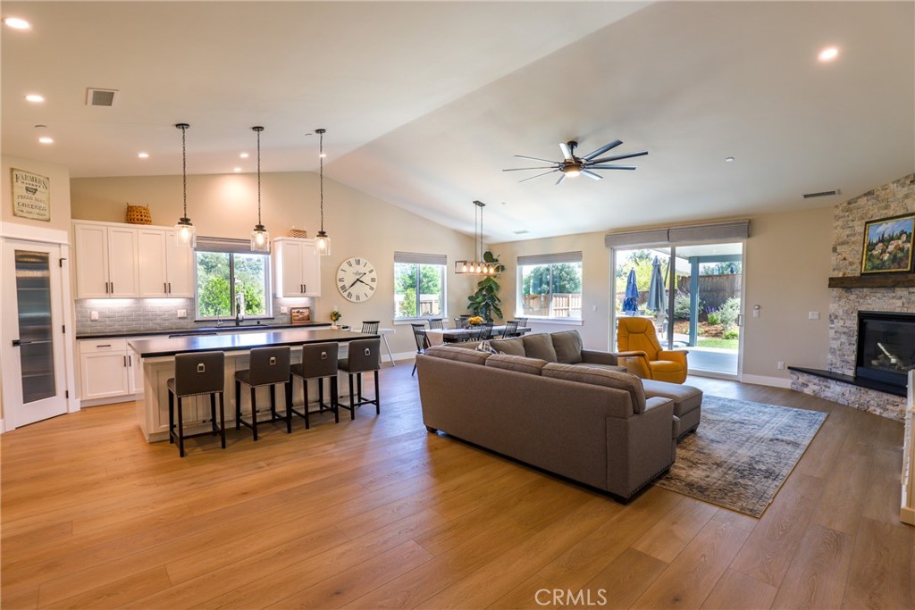 8550 El Corte Road Atascadero, CA 93422 - Photo 6 of 72 a living room with furniture kitchen view and a wooden floor