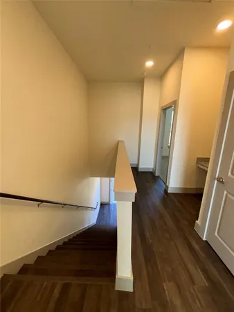 a view of front door with wooden floor