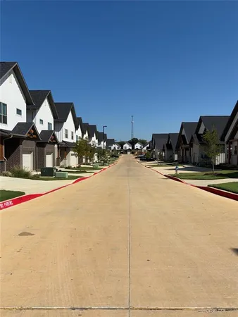 a view of street with houses
