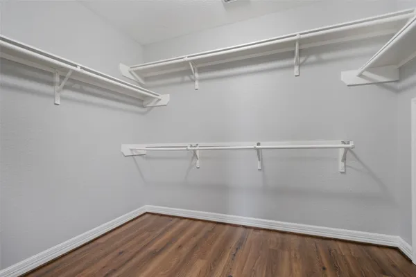 a view of a room with racks on the wall