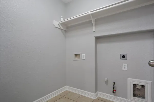 a bathroom with a sink a mirror and shower