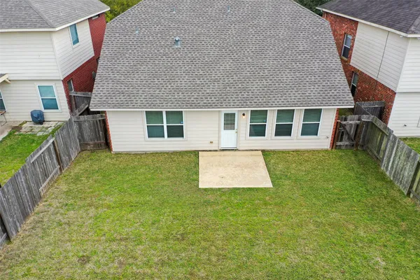 a house view with a garden space
