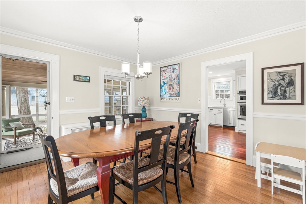 89 Lovell Road Melrose, MA 02176 - Photo 11 of 38 a view of a dining room with furniture window and wooden floor