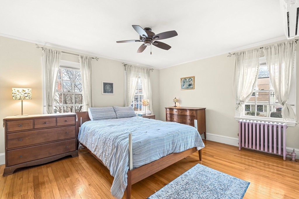 89 Lovell Road Melrose, MA 02176 - Photo 23 of 38 a bedroom with a bed and window