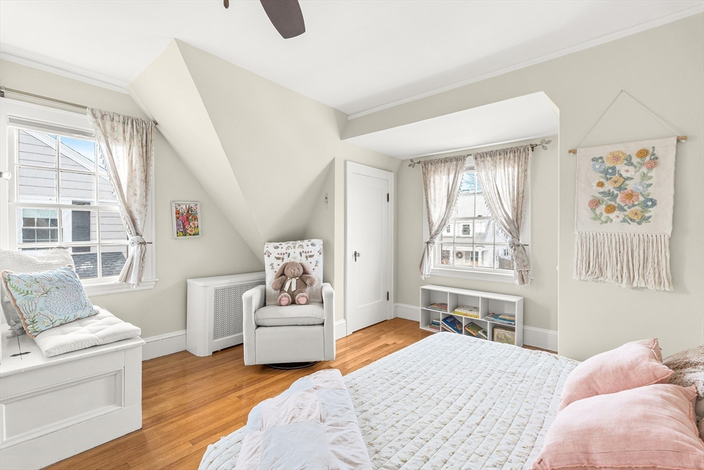 89 Lovell Road Melrose, MA 02176 - Photo 25 of 38 a bedroom with furniture and a large window