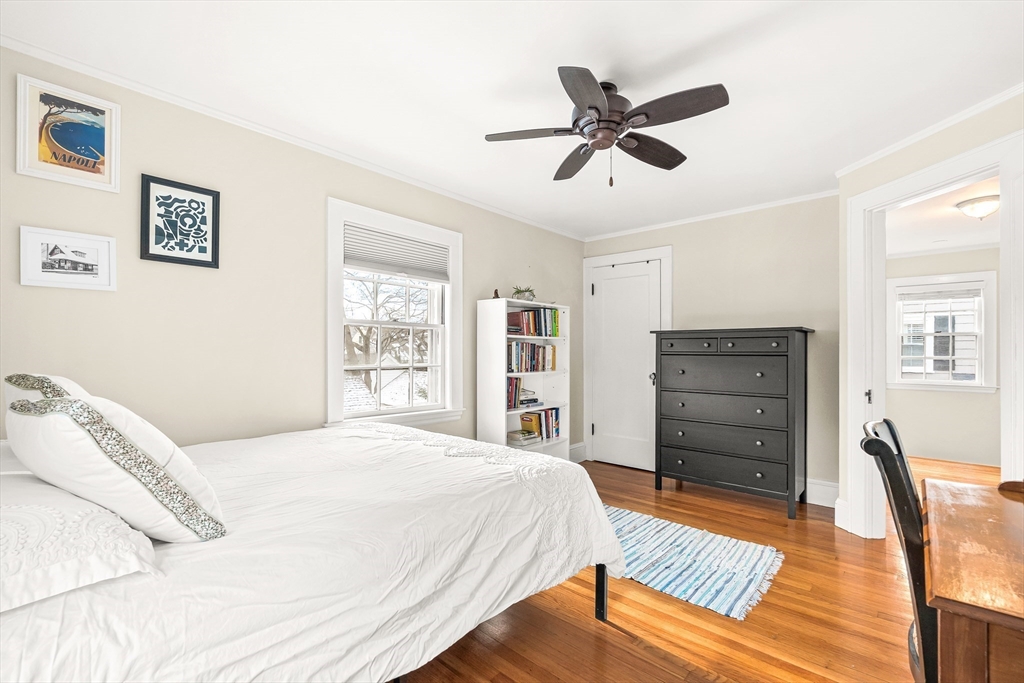 89 Lovell Road Melrose, MA 02176 - Photo 28 of 38 a bedroom with a bed dresser and a window