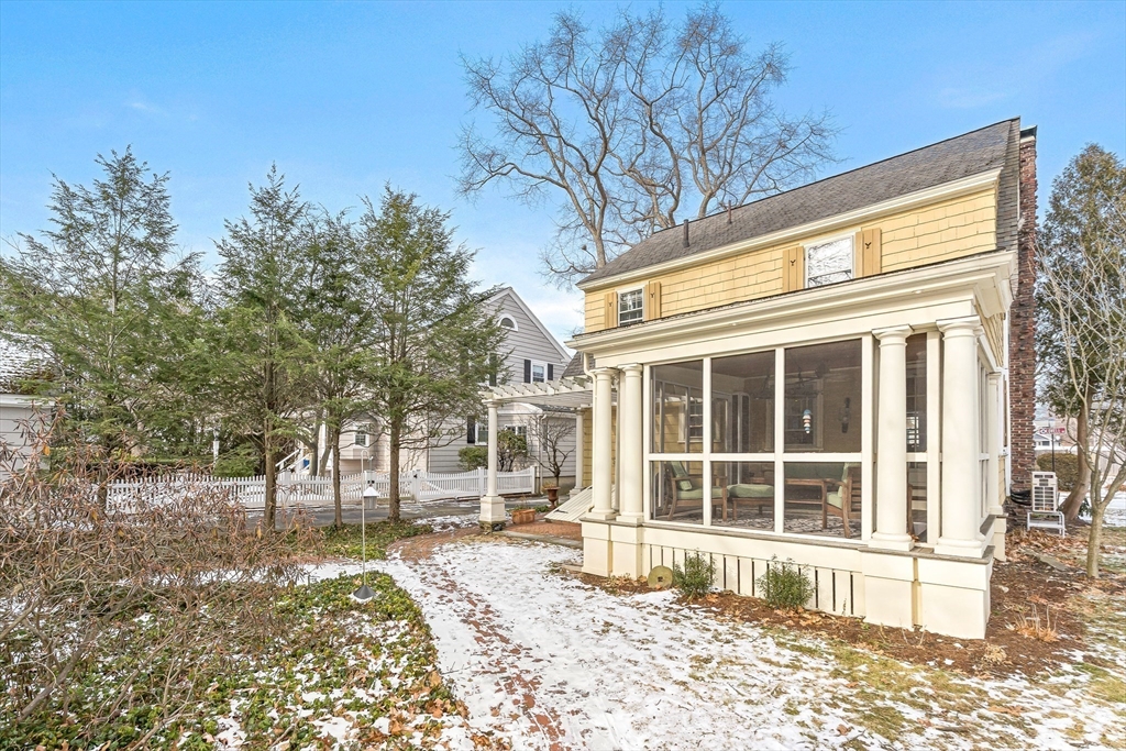 89 Lovell Road Melrose, MA 02176 - Photo 37 of 38 a view of a house with a large tree
