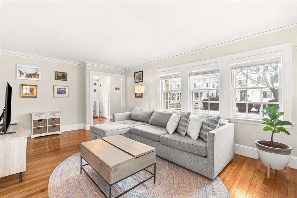 89 Lovell Road Melrose, MA 02176 - Photo 9 of 38 a living room with furniture and a large window