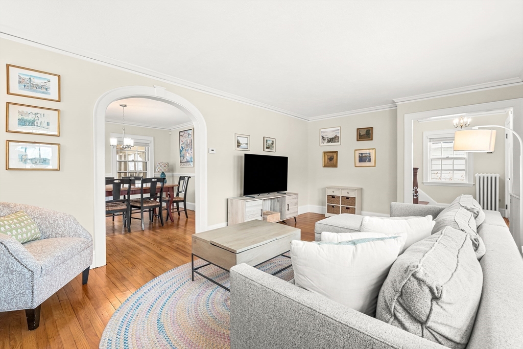 89 Lovell Road Melrose, MA 02176 - Photo 10 of 38 a living room with furniture and a flat screen tv