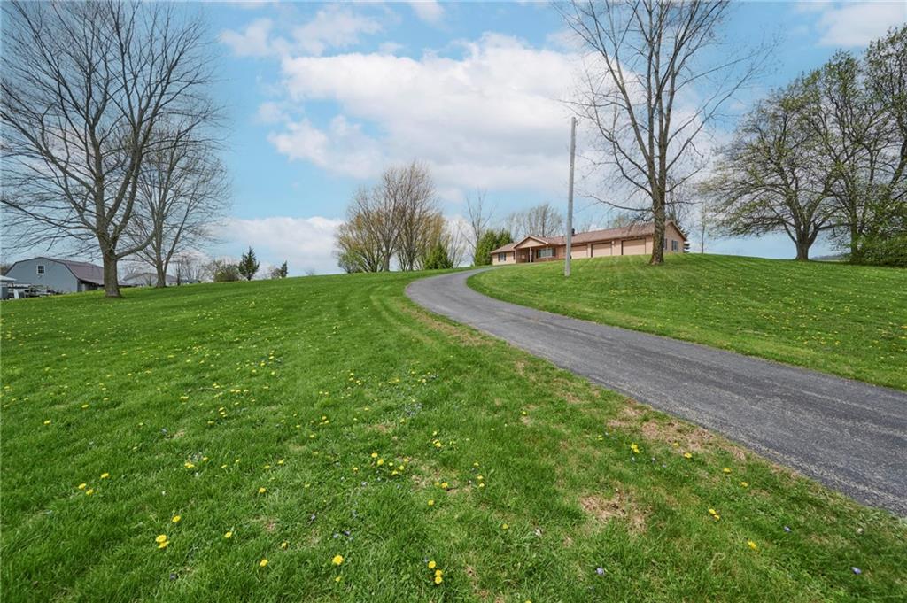 135 Zion Church Road Slippery Rock, PA 16057 - Photo 33 of 33 Nestled on top of a hill with a paved, curving driveway for picturesque views!