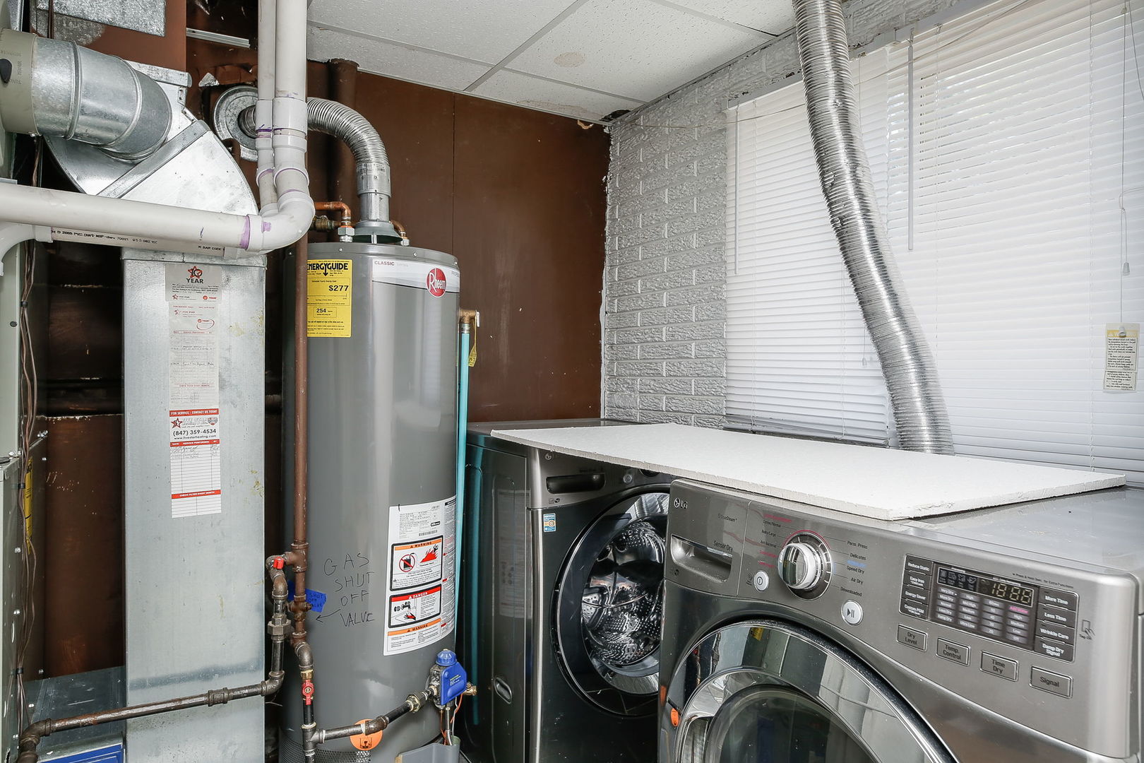 458 White Pine Road Buffalo Grove, IL 60089 - Photo 19 of 25 a utility room with dryer and washer