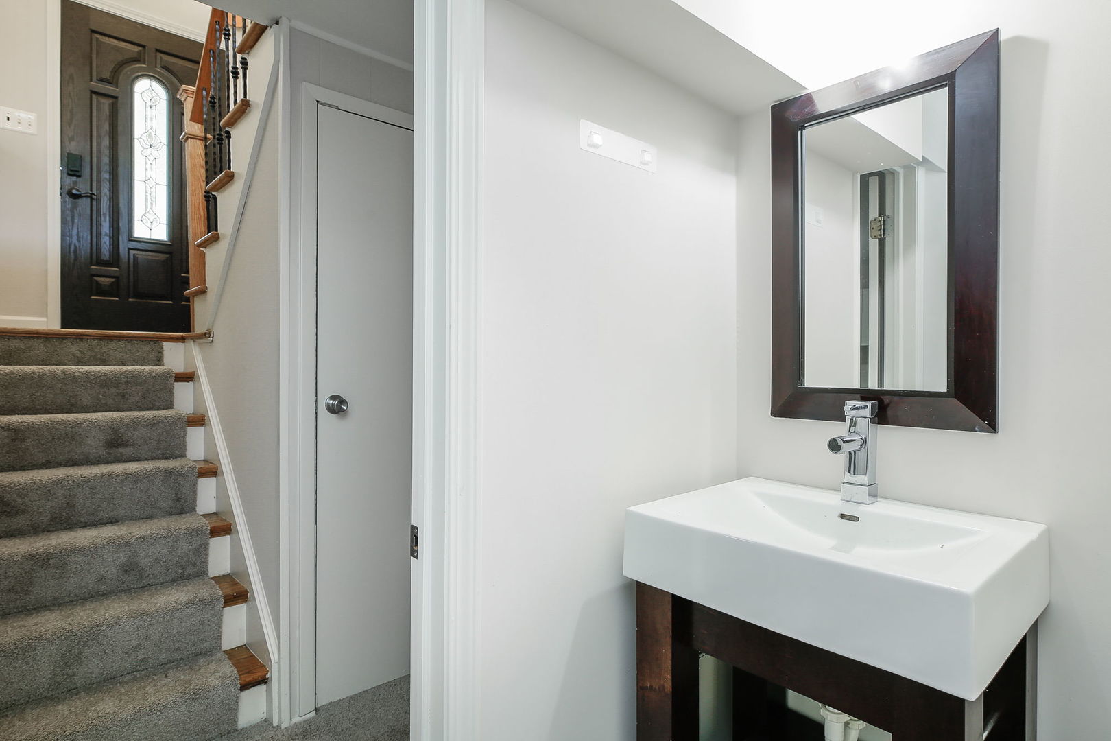 458 White Pine Road Buffalo Grove, IL 60089 - Photo 20 of 25 a bathroom with a sink and a mirror