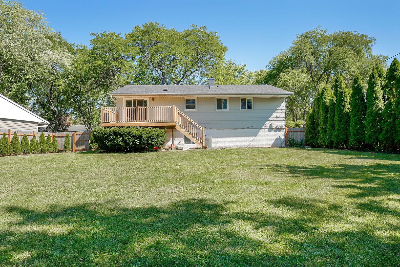 458 White Pine Road Buffalo Grove, IL 60089 - Photo 23 of 25 a front view of house with yard and trees