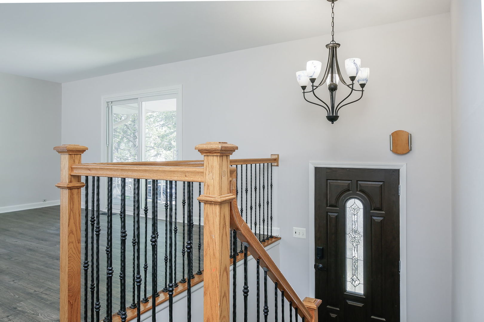 458 White Pine Road Buffalo Grove, IL 60089 - Photo 3 of 25 a view of a livingroom with furniture wooden floor chandelier