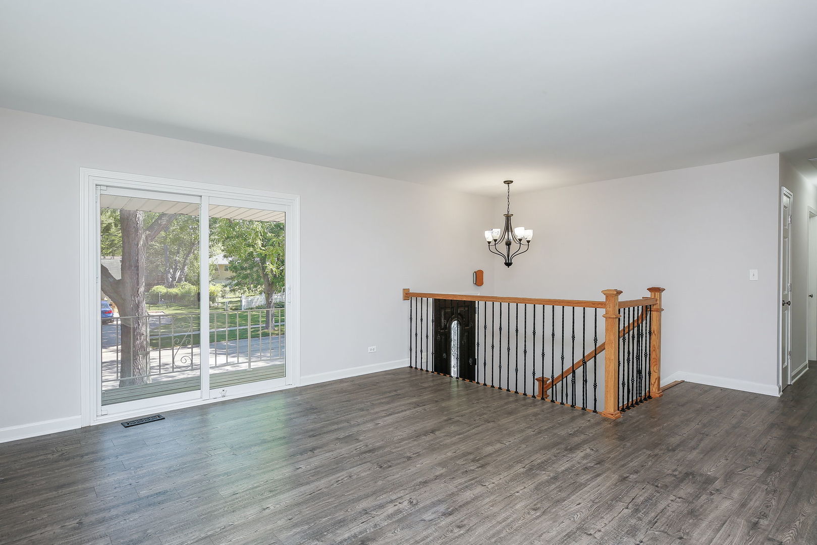 458 White Pine Road Buffalo Grove, IL 60089 - Photo 4 of 25 a view of a room with wooden floor fan and windows