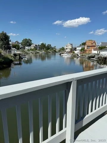 a view of a lake from a balcony