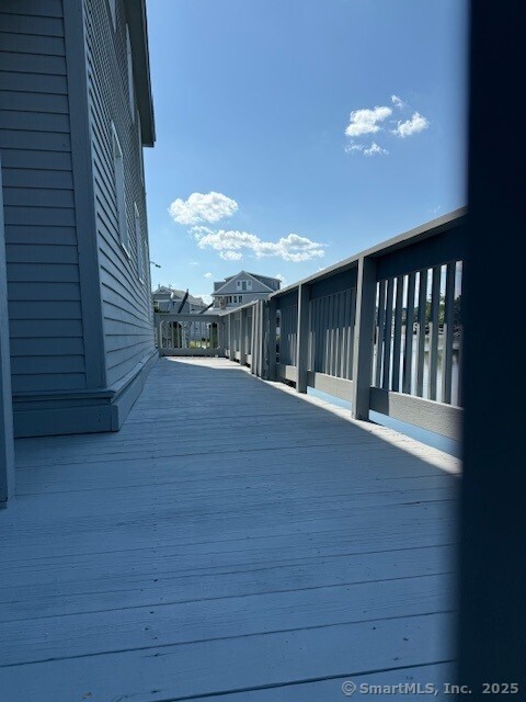 2142 Fairfield Beach Road Fairfield, CT 06824 - Photo 21 of 30 a view of a balcony