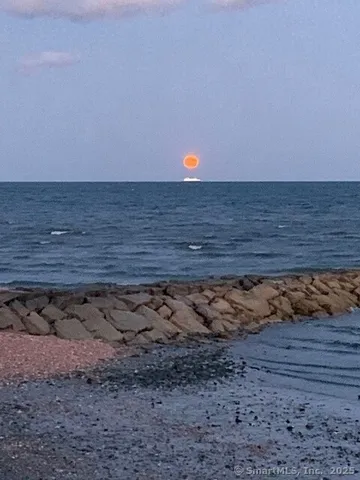 a view of a dry room with wooden floor