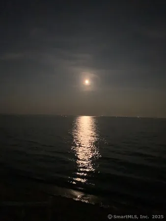 a view of a dry room with wooden floor