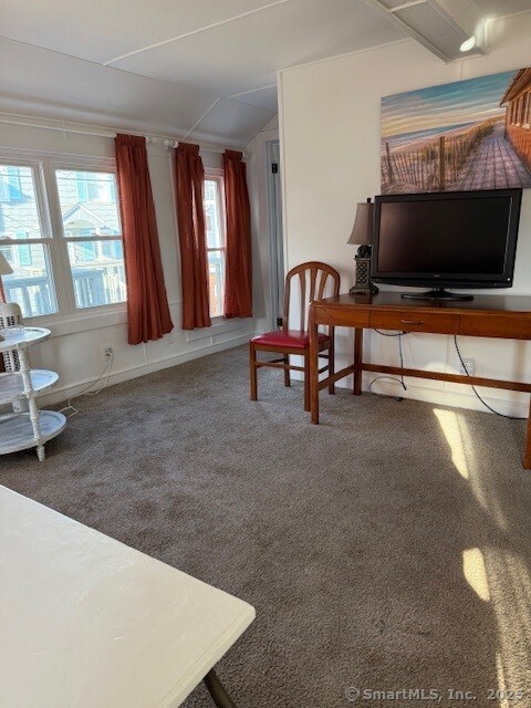2142 Fairfield Beach Road Fairfield, CT 06824 - Photo 7 of 30 a living room with furniture and a flat screen tv