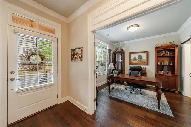 a living room with furniture fireplace and a flat screen tv