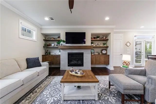 a en suite bathroom with a sink double vanity and a mirror