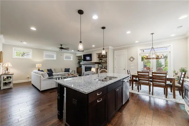 a balcony with furniture and a potted plant