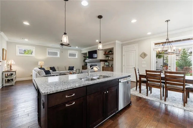 a spacious bathroom with a tub sink and mirror