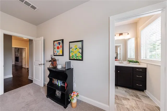 a view of a workspace with furniture