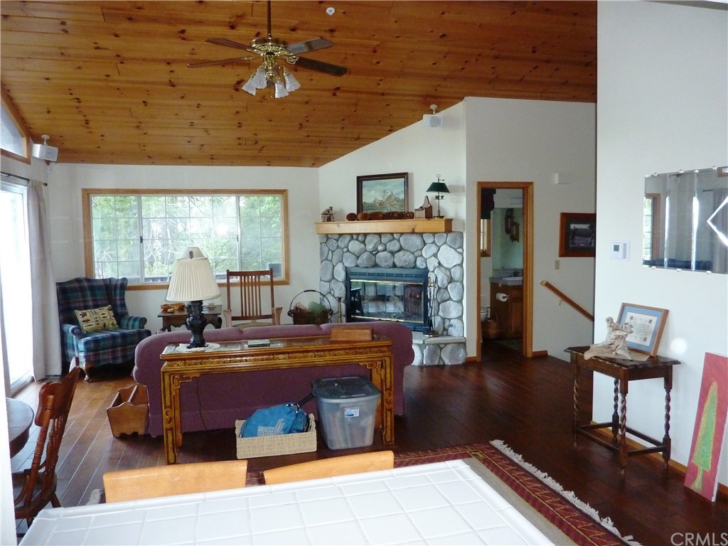 25274 N Road Twin Peaks, CA 92391 - Photo 13 of 35 a living room with furniture and a fireplace
