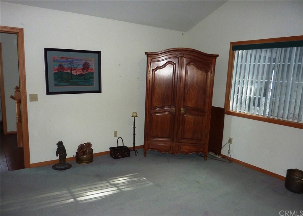 25274 N Road Twin Peaks, CA 92391 - Photo 14 of 35 a view of a room with air conditioner and a window