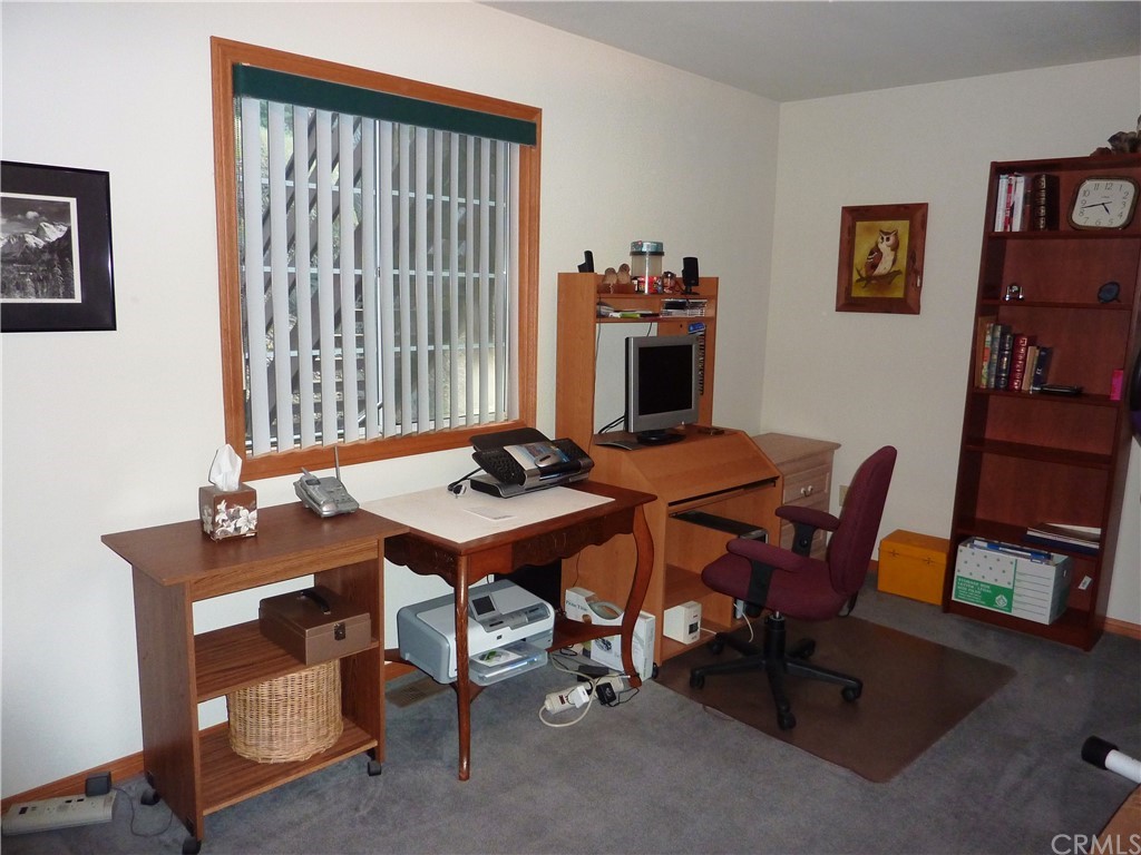 25274 N Road Twin Peaks, CA 92391 - Photo 24 of 35 a view of a workspace with furniture