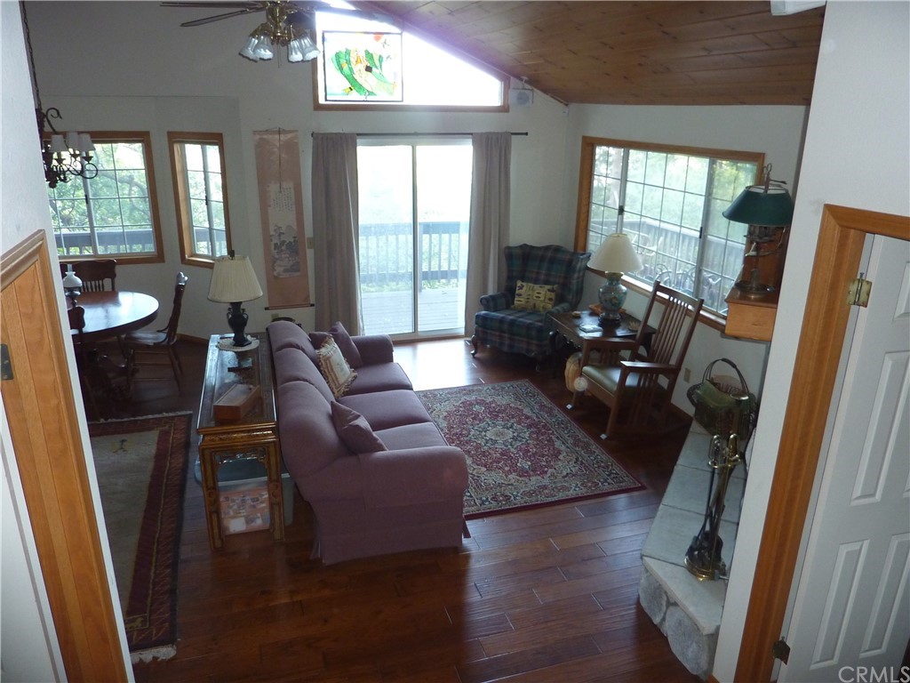 25274 N Road Twin Peaks, CA 92391 - Photo 9 of 35 a living room with furniture and a large window