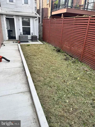 a view of a pathway with a house