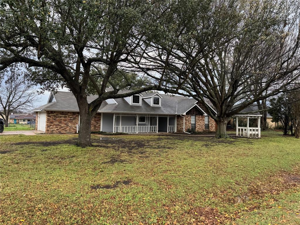 116 Ridge Crest Street Red Oak, TX 75154 - Photo 17 of 18 a front view of a house with a yard