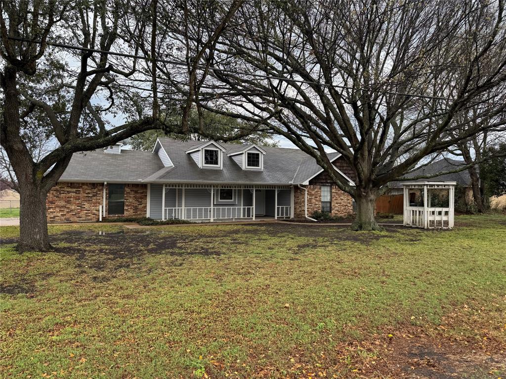 116 Ridge Crest Street Red Oak, TX 75154 - Photo 18 of 18 a front view of a house with a garden