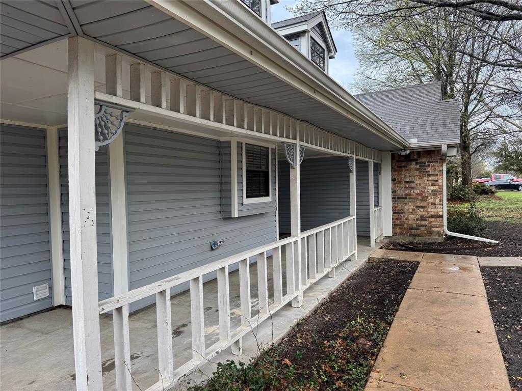 116 Ridge Crest Street Red Oak, TX 75154 - Photo 3 of 18 a view of a house with wooden fence