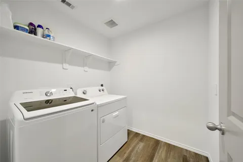 a view of a house with swimming pool and sitting area