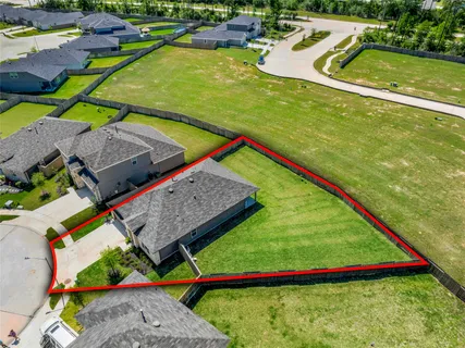 a view of swimming pool from a balcony